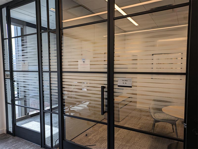 A wavy strip wrap on the office glass.